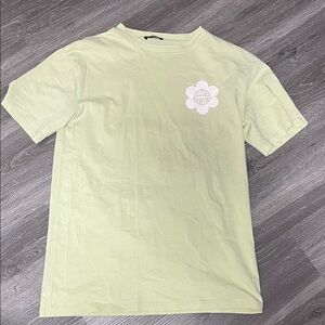 Light Green Graphic Tee with White Flower Logo